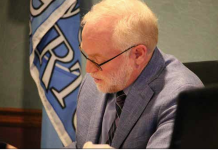 County puts government changes under the microscope