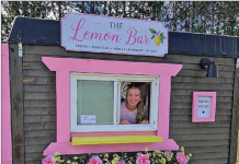 Teen squeezing life out of lemons